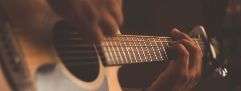 Guitar by Jefferson Santos on Unsplash: Roomies by Christina Lauren (The Modest Reader)