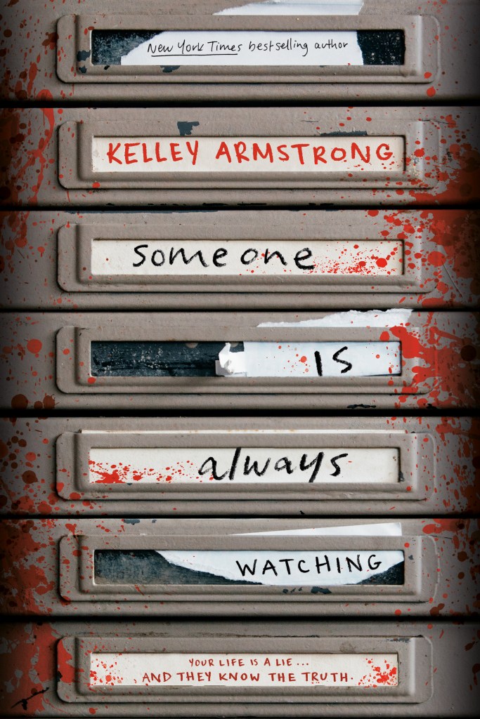 A filing cabinet splattered with blood with the book title and author's name on it